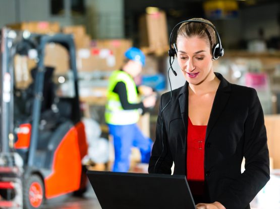 dispatcher using headset at warehouse of forwarding